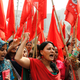 epa05782154 Garment workers shout slogans as they attend a protest rally with red flags demanding the release of 25 of their leaders and reopen the closed factories organised by the National Garment Workers Federation (NGWF) in front of the National Press Club in Dhaka, Bangladesh, 10 February 2017. The workers also demanded a raise in their salaries during the rally. EPA/ABIR ABDULLAH